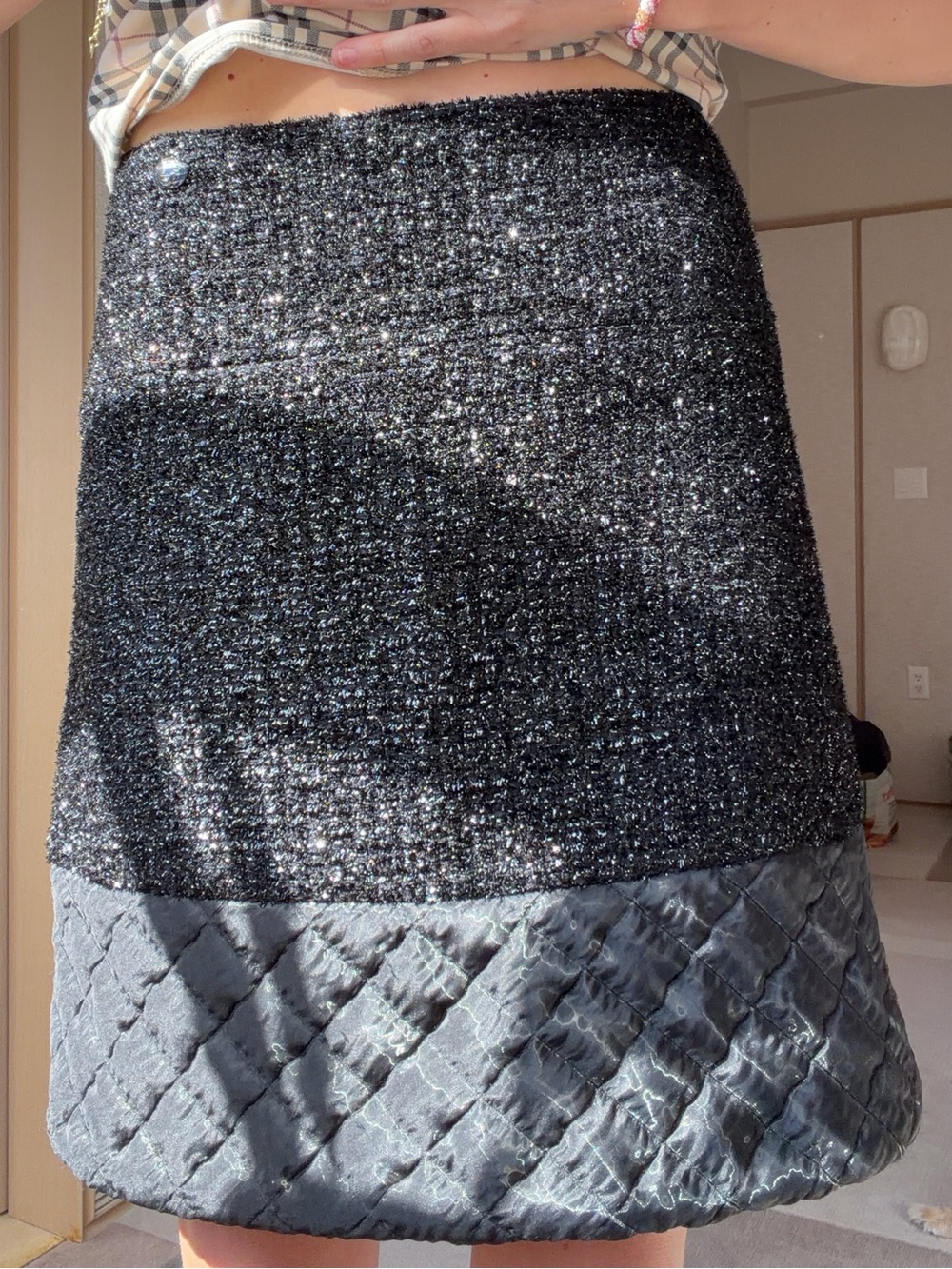 CHANEL Black Sparkle Tweed Mini Skirt with Quilted Hem